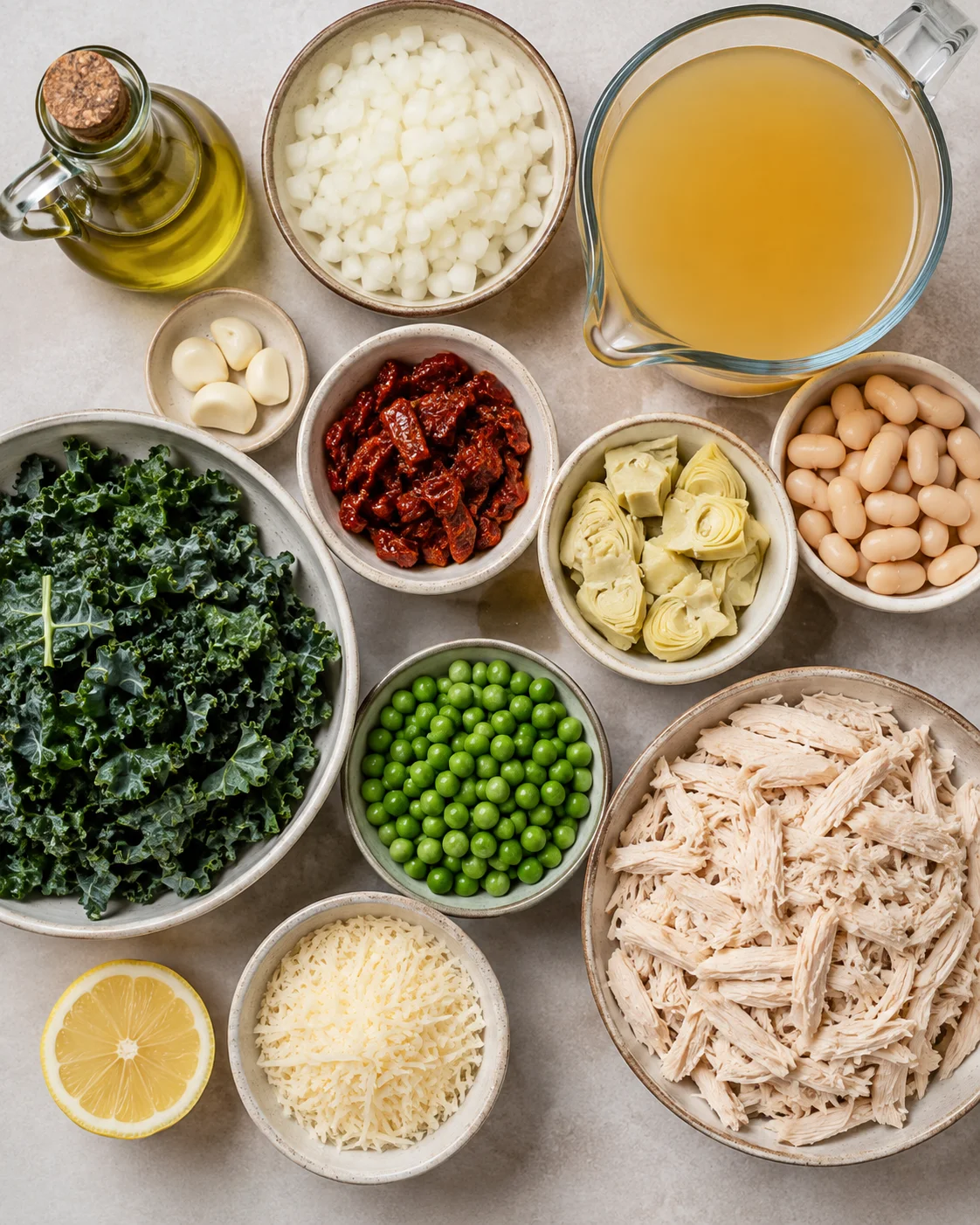 Assorted ingredients for high-protein chicken soup including chicken, beans, kale, and sun-dried tomatoes.