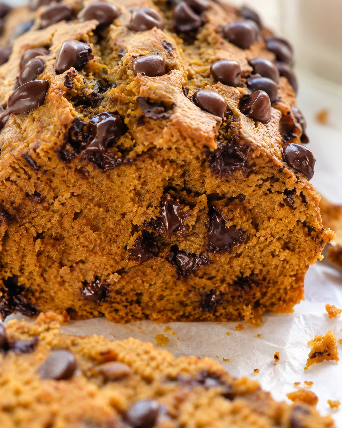 Close-up detail of the pumpkin bread crumb with melted chocolate chips